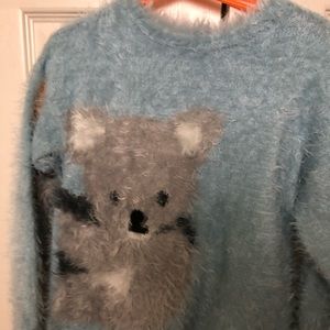 Girls size 8 soft sweaters.  2!